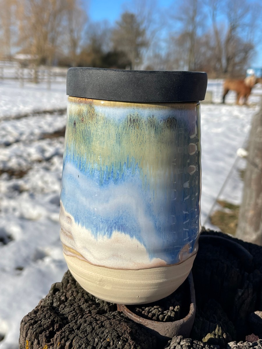 Travel mugs made by Vicki G. - A student at Donn Zver's School of Pottery