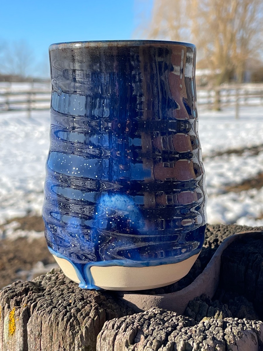 Travel mugs made by Vicki G. - A student at Donn Zver's School of Pottery